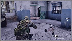 Możesz już wyjść z budynku i skierować się w stronę widocznej w oddali niebieskiej bramki #1 , prowadzącej do lokalnej szkoły - Diwaniya, Irak (2) | Opis przejścia | Tom Clancys Splinter Cell Conviction - Tom Clancys Splinter Cell: Conviction - poradnik do gry