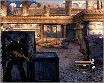 W dalszej fazie bitwy warto schować się za jedną z zasłon zlokalizowanych w pobliżu terminalu (screen) i z takiego właśnie miejsca bronić się przed atakami wrogów - Ruins - Opis przejścia (2) | Rzym | Alpha Protocol - Alpha Protocol - poradnik do gry