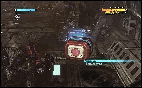 Następnie przejdź przez wrota z lewej [1] - - Część 1 - Ciemny Energon (1) - Opis przejścia - Transformers: Wojna o Cybertron - poradnik do gry