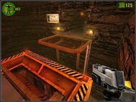 Teraz możesz postąpić dwojako - kontynuować wędrówkę drzwiami na wprost bądź używając objazdu - Kopalnie | Opis przejścia Red Faction - Red Faction - poradnik do gry