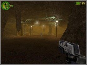 Po wyjściu z korytarza, widzisz w oddali oddział wroga - możesz go zlikwidować, aczkolwiek nie jest to konieczne - Kopalnie | Opis przejścia Red Faction - Red Faction - poradnik do gry