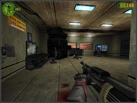 Wejdź do strażnicy i wciśnij przycisk otwierając wrota do kolejnego pomieszczenia - Koszary #2 | Opis przejścia Red Faction - Red Faction - poradnik do gry