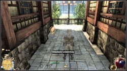 Droga prowadząca do akademików (M23:7), po przejściu obok pokojów profesorów (M23:9), tuż przy ścianie - Ślad w dokumentach | Zadania Two Worlds II - Nowe Ashos - Two Worlds II - poradnik do gry