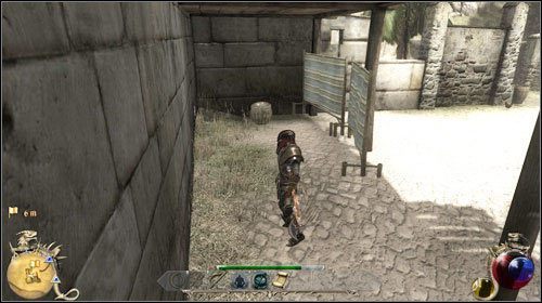 Zgodnie z prośbą w liście, zanieś świece do szpitala polowego (M12:3) i zostaw je w koszu, który znajdziesz za parawanem - Czarne świece | Zadania Two Worlds II - Gildia nekromantów - Two Worlds II - poradnik do gry