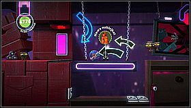 Kontynuujemy podróż w lewo aż do dziury, w której Sackboty się zatrzymają - Zaostrzony rygor | Fabryka lepszego jutra | LittleBigPlanet 2 - LittleBigPlanet 2 - poradnik do gry