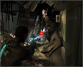 Powróć do skrzyżowania i zbadaj zawalone płonące przejście znajdujące się na wprost od bohatera - Rozdział 1 (3) | Opis przejścia gry Dead Space 2 - Dead Space 2 - poradnik do gry