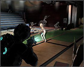 Zastanów się czy już teraz nie rozstawić na scenie min, gdyż zaliczenie mini-gry hakerskiej doprowadzi do zainicjowania nowej bitwy - Rozdział 6 (4) | Opis przejścia gry Dead Space 2 - Dead Space 2 - poradnik do gry