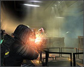 Proponuję przemieszczać się cały czas prosto, aż do momentu dotarcia do lewego górnego narożnika magazynu - Rozdział 9 (3) | Opis przejścia gry Dead Space 2 - Dead Space 2 - poradnik do gry