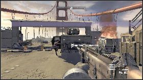 Po ostrzale rusz w stronę palących się wraków [1] i wejdź do amerykańskiego transportera [2] - Misja 7 - Most Golden Gate (2) | Opis przejścia Homefront - Homefront - poradnik do gry