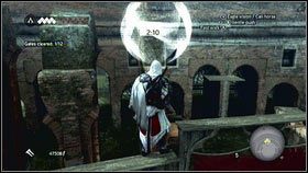 Gdy dotrzesz do pierwszego punktu, wejdź na drewnianą konstrukcję przed tobą [1], a z niej przeskocz dalej po wyznaczonej trasie [2] - Zadania złodziejów (1) | Zadania poboczne Assassins Creed Brotherhood - Assassins Creed: Brotherhood - poradnik do gry