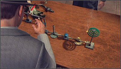 Prawidłowe ustawienie przedmiotów pokazane zostało na powyższym screenie - Case 17 - The Gas Man (2) | Główne śledztwa w LA Noire - L.A. Noire - poradnik do gry