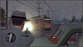 Zaparkuj w odległości kilkunastu metrów od tramwaju i schowaj się za radiowozem #1 - Case 18 - A Walk in Elysian Fields (2) | Główne śledztwa w LA Noire - L.A. Noire - poradnik do gry