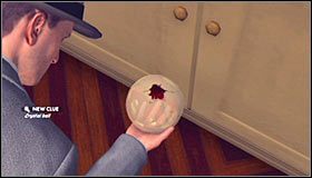 Podejdź teraz do półek na książki zlokalizowanych na lewo od stolika #1 - Case 21 - A Different Kind of War (1) | Główne śledztwa w LA Noire - L.A. Noire - poradnik do gry