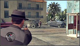 Ustaw się przy niebieskim kontenerze na śmieci i w pierwszej kolejności zlikwiduj przeciwnika, który pojawi się po prawej stronie #1 - Against the Odds | Przestępstwa w LA Noire - L.A. Noire - poradnik do gry