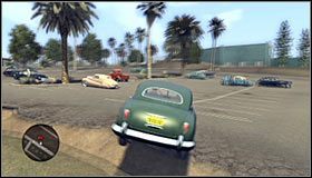 Po chwili zostaniesz zmuszony do wykonania kolejnego skrętu w prawo, a następnie do skręcenia w lewo i przejechania obok jednego z budynków #1 - Hot Property | Przestępstwa w LA Noire - L.A. Noire - poradnik do gry