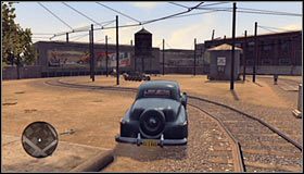 Zjedź w pobliżu oznaczonego punktu na tory kolejowe #1 - Taśmy - Mapa 1 | Taśmy filmowe w LA Noire - L.A. Noire - poradnik do gry