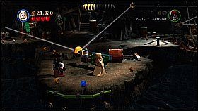 Przebiegamy w lewo i układamy kolejną stertę wysadzonych klocków - Nora przemytników - opis przejścia | Klątwa Czarnej Perły - LEGO Piraci z Karaibów - poradnik do gry