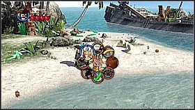 Butelka 1 - Zaraz na początku wykopujemy butelkę psem - Nora przemytników - butelki | Klątwa Czarnej Perły - LEGO Piraci z Karaibów - poradnik do gry