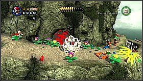 Butelka 4 - W tym samym obszarze co butelka nr 3, czyli małej wiosce na wzgórzu, szukamy teleskopu za pomocą kompasu Jacka - Pelegosto - butelki | Skrzynia umarlaka | LEGO Piraci z Karaibów - LEGO Piraci z Karaibów - poradnik do gry