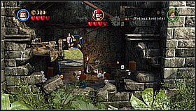 Używamy młotka do naprawienia mechanizmu otwierającego drzwi do wieży - Isla Cruces - opis przejścia | Skrzynia umarlaka | LEGO Piraci z Karaibów - LEGO Piraci z Karaibów - poradnik do gry