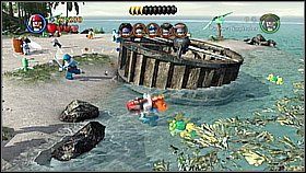 Butelka 7 - W scenie na dużym kole musimy podskoczyć po butelkę - Isla Cruces - butelki | Skrzynia umarlaka | LEGO Piraci z Karaibów - LEGO Piraci z Karaibów - poradnik do gry