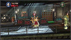 Zanosimy skrzynię z dynamitem do windy (na zielone miejsce) - Kraken - opis przejścia | Skrzynia umarlaka | LEGO Piraci z Karaibów - LEGO Piraci z Karaibów - poradnik do gry