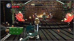 Łapiemy za dwa łańcuchy po obu stronach sauny (są bliżej wejścia) - Singapur - opis przejścia | Na krańcu świata | LEGO Piraci z Karaibów - LEGO Piraci z Karaibów - poradnik do gry