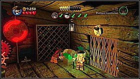 Na koniec zanosimy cylinder na mechanizm po prawej [1] i przekręcamy go mieczem - Trybunał braci - opis przejścia | Na krańcu świata | LEGO Piraci z Karaibów - LEGO Piraci z Karaibów - poradnik do gry