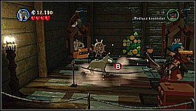 Zanosimy kość psu - jest koło stołu na głównej sali - Trybunał braci - opis przejścia | Na krańcu świata | LEGO Piraci z Karaibów - LEGO Piraci z Karaibów - poradnik do gry