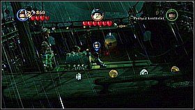 Dostajemy się z lampą całkiem na prawo - na niższy pokład - i odstraszamy fioletowe macki trzymające kufer - Wir - opis przejścia | Na krańcu świata | LEGO Piraci z Karaibów - LEGO Piraci z Karaibów - poradnik do gry