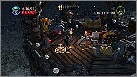 W wieży wchodzimy do górę i bierzemy pochodnię - Zatoka Whitecap - opis przejścia | Na nieznanych wodach | LEGO Piraci z Karaibów - LEGO Piraci z Karaibów - poradnik do gry