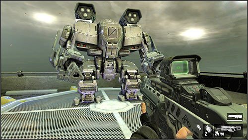 Nasz nowy pancerz wspomagany [1] wyposażony został w działka obrotowe, wyrzutnie rakiet do walki z helikopterami i innymi mechami oraz tarczę chroniącą nas przed pociskami - Poziom 06- Most | Opis przejścia | FEAR 3 - F.3.A.R. - poradnik do gry