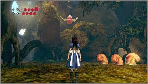Dochodzimy do przejścia zagrodzonego drzewami - po prawej znajdujemy fruwający świński ryjek - Slug with a shell | Rozdział 1 - Hatters Domain | Alice Madness Returns - Alice: Madness Returns - poradnik do gry