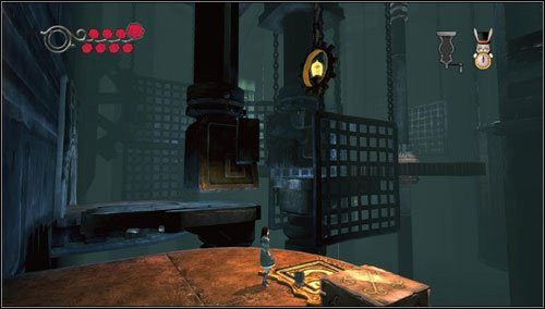 Przeskakujemy obok ciężkich pras i wskakujemy na platformę o złotym kolorze - Cranking Up & Pressing Down (1) | Rozdział 1 - Hatters Domain - Alice: Madness Returns - poradnik do gry