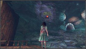 Strzelamy w zawieszony nad jaskinią przełącznik i wyskakujemy na górę po kamiennych głowach - Barrelbottom | Rozdział 2 - Deluded Depths | Alice Madness Returns - Alice: Madness Returns - poradnik do gry