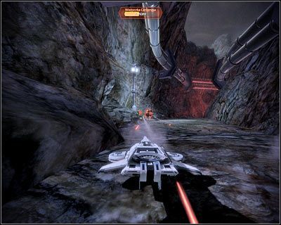 Leć teraz prosto, będąc gotowym do zniszczenia kolejnej wieżyczki Cerberusa - (2) Odnalezienie przełącznika wyłączenia alarmu (1) | Nadzorca- Stacja Wulkan - Mass Effect 2: Overlord - poradnik do gry