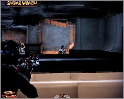 Kolejna grupa przeciwników wyjdzie z ukrycia przy próbie dotarcia do widocznych w oddali biur - (6) Odnalezienie Liary - Kryjówka Handlarza Cieni - Mass Effect 2: Lair of the Shadow Broker - poradnik do gry