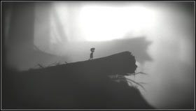 Nasze pierwsze kroki kierujemy w lewo w celu zebrania niewielkiego świecącego obiektu [1] - Rozdział 0 | Opis przejścia Limbo - Limbo - poradnik do gry