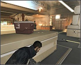 Zatrzymaj się po dotarciu do miejsca, w którym kończy się pierwszy stół #1 - (2) Odparcie ataku na placówkę | Deus Ex Bunt Ludzkości - Deus Ex: Bunt Ludzkości - Directors Cut - poradnik do gry