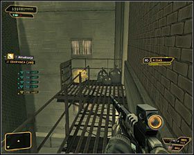 Skorzystaj z drabiny i następnie przystąp do wspinaczki, zatrzymując się w miejscu, w którym kończy się klatka schodowa #1 - Upgradey broni | Deus Ex Bunt Ludzkości - Deus Ex: Bunt Ludzkości - Directors Cut - poradnik do gry