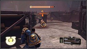 W dalszą drogę udaj się przez bramę obok wspomnianej wcześniej amunicji [1] - 5 - Inkwizytor - Opis przejścia - Warhammer 40,000: Space Marine - poradnik do gry