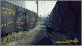 Po przejściu przez wagon [1] należy skręcić w lewo w kierunku słupów linii energetycznej [2] - Rozdział 6 (1) | Opis przejścia Resistance 3 - Resistance 3 - poradnik do gry