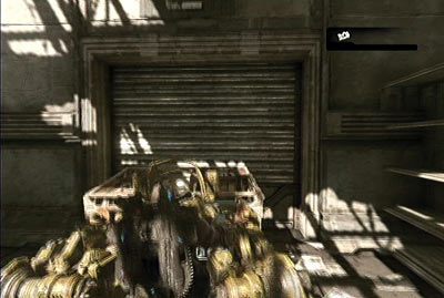 Wróć do robota i przy jego pomocy zniszcz kopnięciem (klawisz B) któreś z metalowych wrót prowadzących na zewnątrz - III - Powrót do domu | Akt 1 w Gears of War 3 - Gears of War 3 - poradnik do gry (opis przejścia, nieśmiertelniki, osiągnięcia)