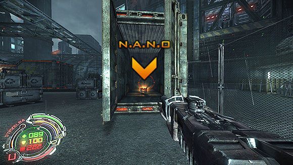 Teraz uruchom wózek podnośnikowy i przeskocz po skrzyniach na drugą stronę ogrodzenia, gdzie trafisz na drugą dużą paczkę N - Poziom IV- Targowisko (2) | Opis przejścia | Hard Reset - Hard Reset - poradnik do gry