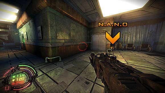 Schodami, które znajdują się za drzwiami dotrzesz do sali z terminalem ulepszeń i paczką N - Poziom VII- Szpital (2) | Opis przejścia | Hard Reset - Hard Reset - poradnik do gry