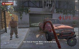 Mike stoi przed wejściem do Wieży Ratowników, tuż przy niewielkiej stercie ciał nieumarłych #1 - Z prochu powstałeś... | Akt 1 - zadania poboczne i wydarzenia w Dead Island - Dead Island - poradnik do gry