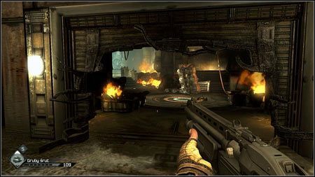 Wybuch odblokuje przejście prowadzące do windy, którą wjadą na górę dwaj przeciwnicy - Zniszcz bomby | Opis przejścia Rage 1 - Rage - poradnik do gry