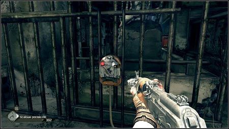 Schody zaprowadzą cie do pomieszczenia, gdzie do kraty będzie przyczepiony pewien mechanizm - Ulepszenie Defibrylatora (1) | Opis przejścia Rage 1 - Rage - poradnik do gry