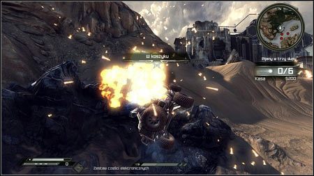 Jadąc z Wioski Hagara do Wellspring będziesz przejeżdżał pod wysoką bramą - Pustkowia | Skoki samochodowe w Rage 1 - Rage - poradnik do gry