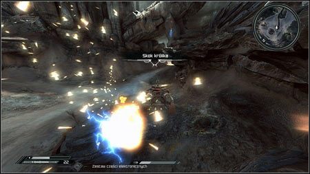 Wybierz trasę po lewej, rozpędź się i skocz, a zniszczysz kolejną maszynę - Wschodnie Pustkowia | Skoki samochodowe w Rage 1 - Rage - poradnik do gry